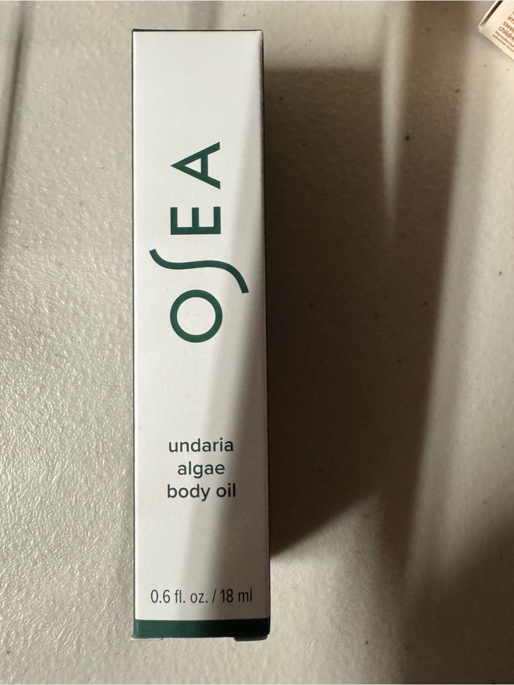 Sea Undaria Algae Body Oil — White and Teal Packaging